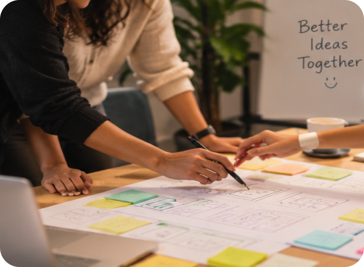 Team planning ideas with sticky notes