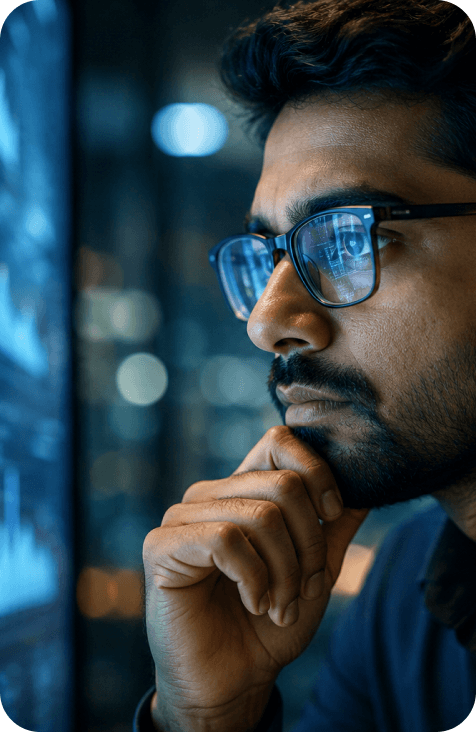 Analyst reviewing data dashboards