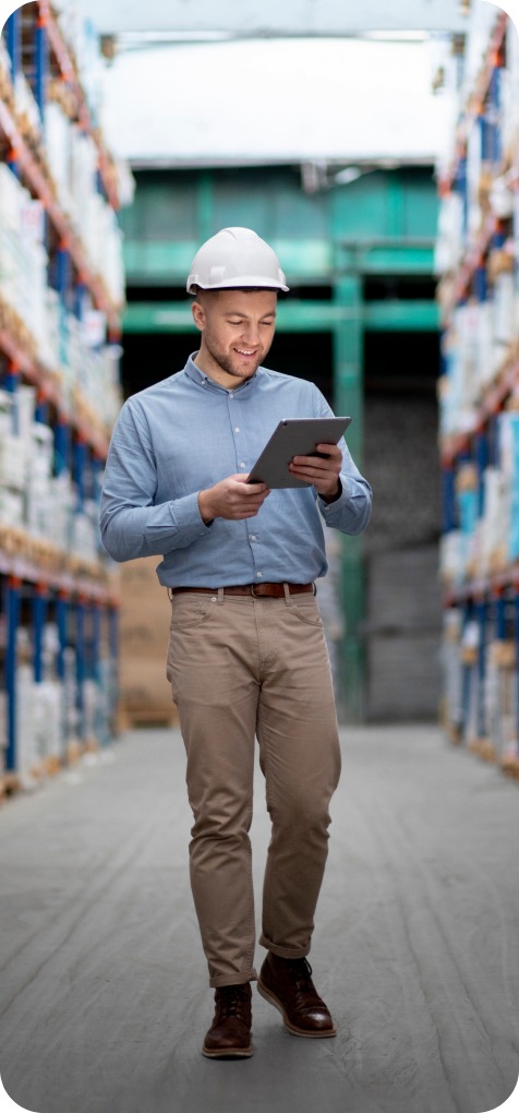 Logistics professional reviewing connected operations